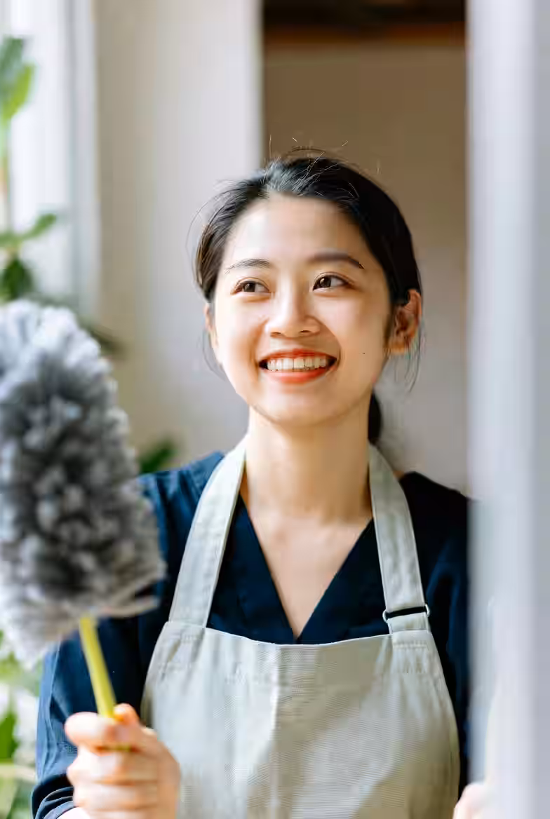 Confident cleaning professional ready to take on the day